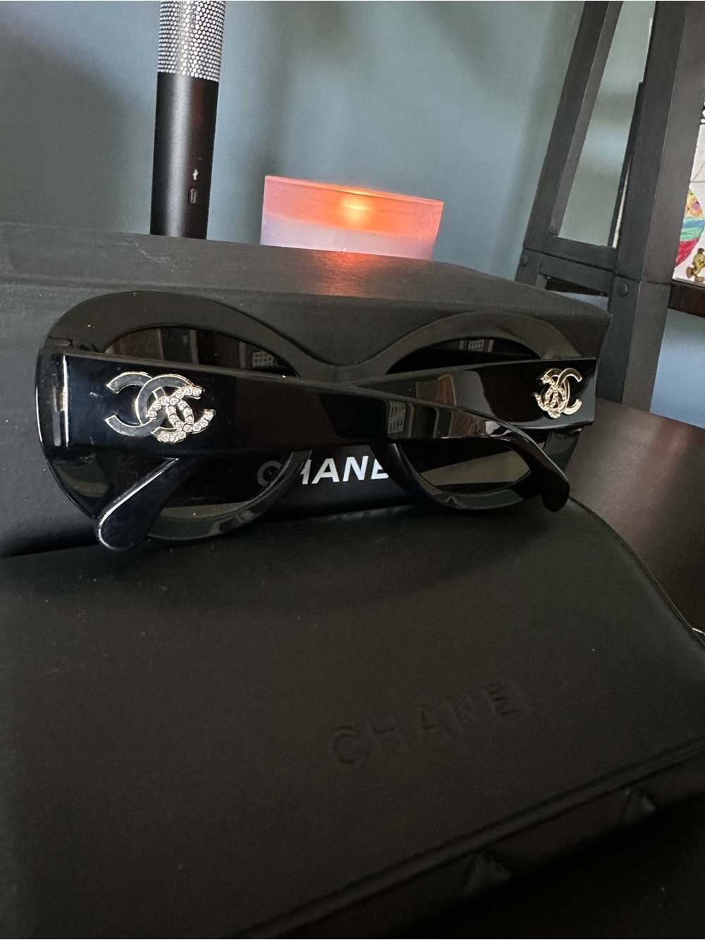 CHANEL Black Oval Sunglasses with Gold Logo Accent - Picture 3 of 6